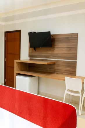 Bancada com TV do apartamento Luxo Superior